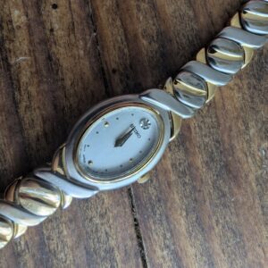 Seiko 1N00-6R70 watch | Ladies Oval Quartz | Crystal Accent | Two-Tone XOXO Bracelet | Pre-Owned