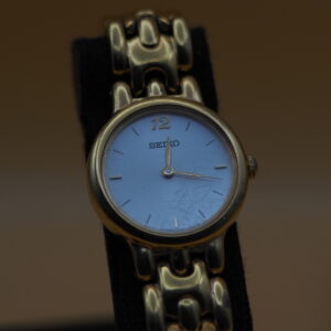 Seiko V700-6389 | Ladies Gold-Tone Quartz | White Dial | Integrated Bracelet | Vintage Pre-Owned